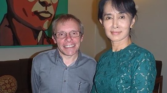 Sean Turnell, left, has long provided advice to Myanmar’s elected leader Aung San Suu Kyi, right. 