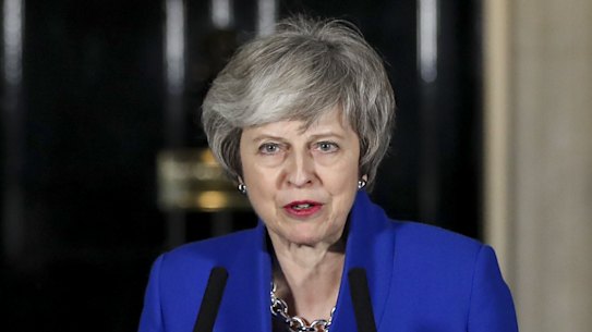 Theresa May after narrowly winning a confidence vote in the British Parliament.
