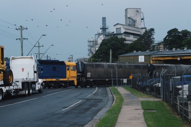 A freight train departs the Manildra mill in Bomaderry, one of the largest employers in the area.