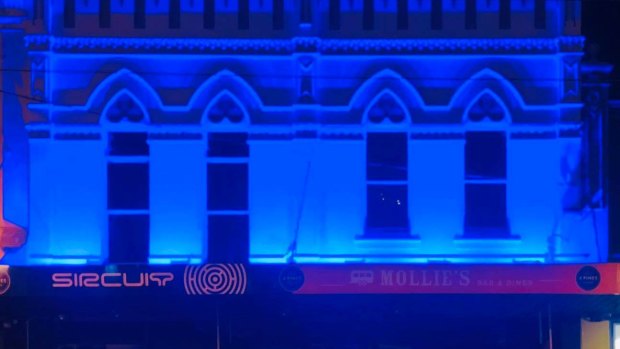 Sircuit bar in Fitzroy was bathed in blue on Thursday to pay tribute to the four police officers killed in the Eastern Freeway tragedy. 