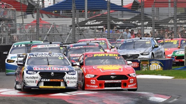 Front runners: Shane van Gisbergen from Red Bull Holden Racing and Scott McLaughlin from Shell V Power Racing jostle for the lead on day two in Adelaide.