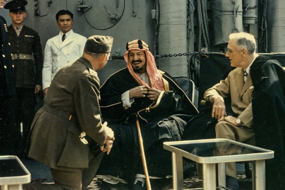 Franklin D Roosevelt (right) was first elected president in 1932, the year King Abdulaziz (centre) formed Saudi Arabia.  Here they speak through an army translator in Egypt in 1945.