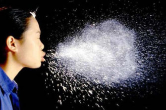 A sneeze can release thousands of droplets of virus.