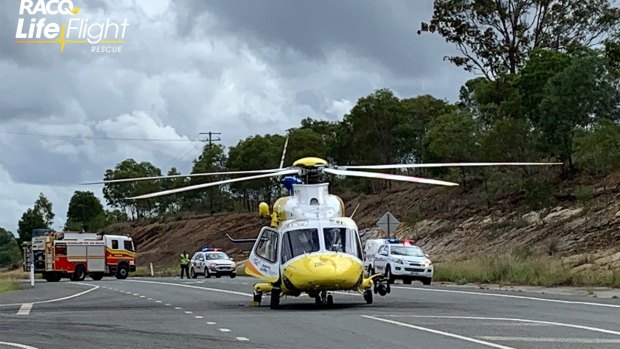 The RACQ LifeFlight Rescue helicopter on the scene at the Wyaralong crash.