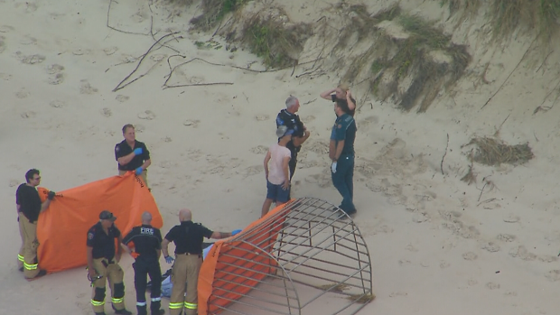 Police will prepare a report for the coroner after the fatal shark attack at Bribie Island.