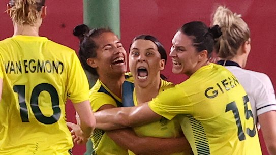 Sam Kerr celebrates.