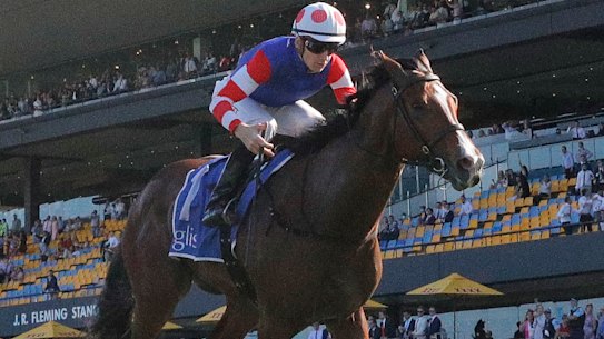 Sejardan (right) holds off Shalatin (orange silks) in the finish of the Golden Gift.