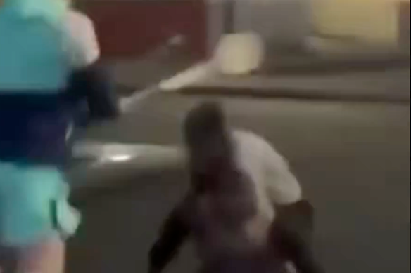 An onlooker ran to the man’s aid and attacked the suspect with a bat.