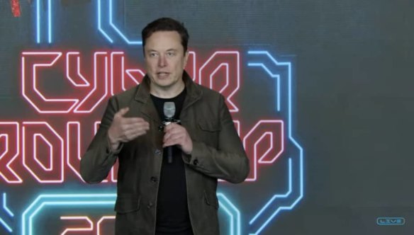 Elon Musk speaks at Tesla’s annual meeting in Texas.