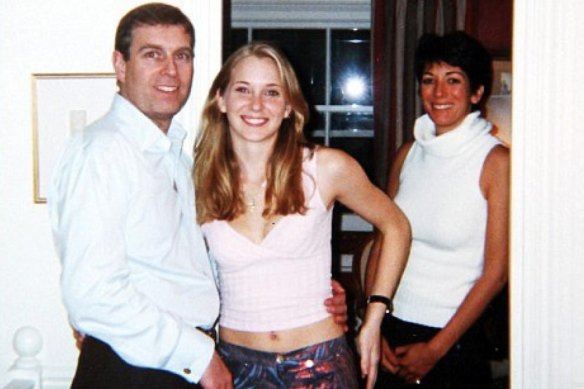 Virginia Giuffre, who is now based in Queensland, pictured with Prince Andrew in 2001. Also pictured is Epstein's then personal assistant Ghislaine Maxwell.