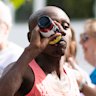 Yomif Kejelcha and Sabastian Sawe during the London Marathon. Sawe is drinking from a Maurten bottle.