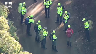 Police and volunteers prepare to head into the bush to search for William on Tuesday morning.