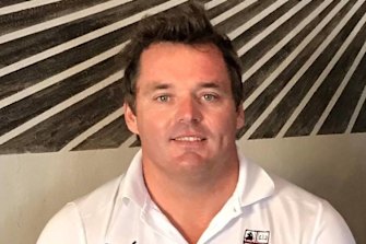 Water Polo Queensland coach Dean Carelse has been suspended after being charged with possessing child exploitation material.