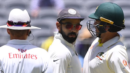 Heated: Australia and India's captains engage in some on-field niceties. 