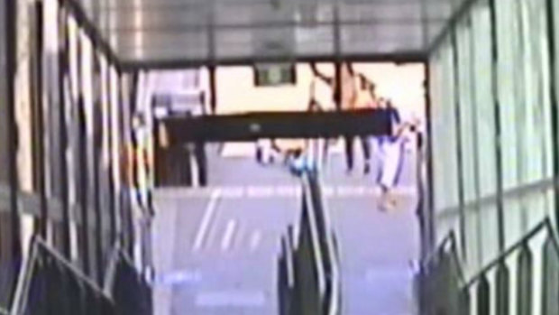 Blurry CCTV images of an incident between a commuter and the Liberal candidate for East Hills, Wendy Lindsay, at Revesby railway station.