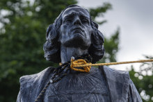 Two ropes are tied around the neck of a Christopher Columbus statue before a group of people pull it down at the Minnesota state Capitol in St Paul, Minnesota, in 2020. Columbus’s legacy is viewed more critically today than when his Letters were auctioned last century. 