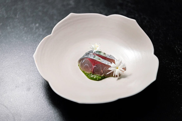 Mackerel marinated in white kimchi.