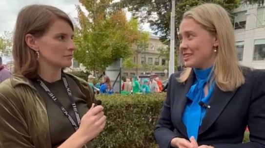 Rachael Dexter interviewing Liberal Kooyong candidate Amelia Hamer at a pre-poll voting centre this week.