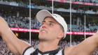 Nick Daicos celebrates after the Collingwood Magpies defeated the Brisbane Lions.