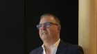 IAG CEO Nick Hawkins is defending $7 billion in insurance claims but still making acquisitions