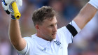 Joe Root celebrates his century on day one.