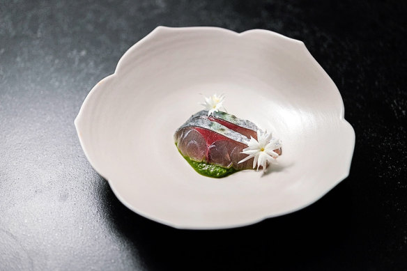 Mackerel marinated in white kimchi.