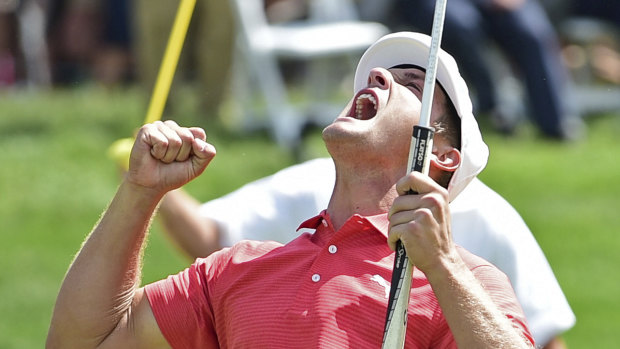 Bryson DeChambeau celebrates after beating Beyong Hun An on the 18th hole in the second playoff hole to claim the tournament.