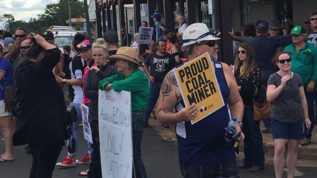 Protestors move to line the main streets of Clermont as the Stop Adani convoy prepares to arrive.