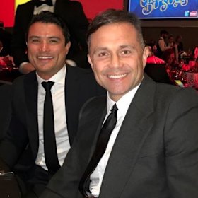 Art dealer Steve Nasteski pictured (right) with rugby league player-turn-buyer’s agent Craig Wing.
