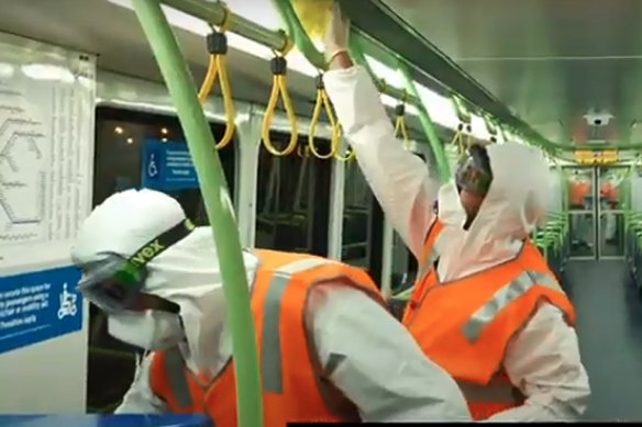 Transclean staff cleaning a Metro train carriage at the height of the COVID-19 outbreak.