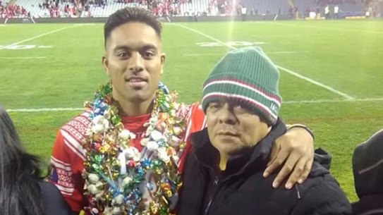 South Sydney forward Tevita “Junior” Tatola, with his father, Tevita Senior, after representing Tonga in a Test match.