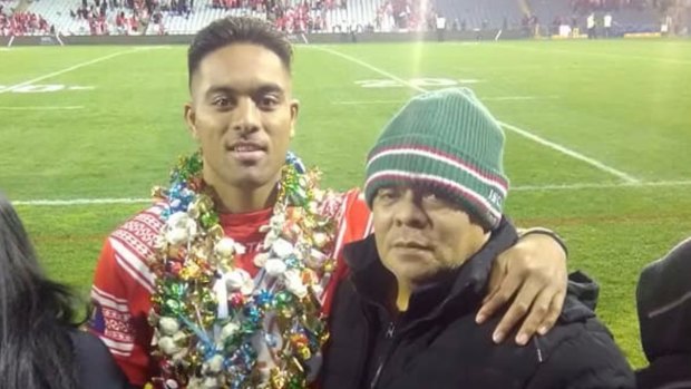 South Sydney forward Tevita “Junior” Tatola with his father, Tevita snr, after representing Tonga in a Test match.