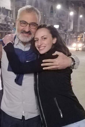 Hazem Hamouda with his daughter Saja when he was released from police custody.