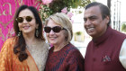 Hillary Clinton, centre, with Mukesh Ambani and wife, Nita, was among the guests at the wedding of Ambani's daughter, Isha, in 2018.