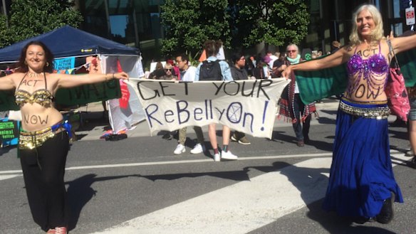 Lismore residents Fiona and Alice (no surnames provided) ‘Re-belly-ing’ at the Extinction Rebellion protest.