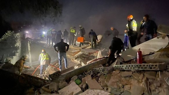 Local media reported an Israeli warplane fired a missile at a number of homes in Bint Jbeil.