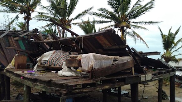 A severely damaged house is seen next to the coast in Puerto Cabezas, Nicaragua. 