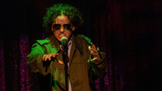 Billy Fogarty performs slam poetry.