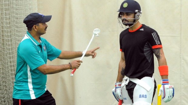 Kohli works with Lalchand Rajput in 2014.