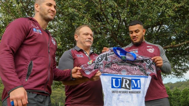 Honour: Cliff Lyons shows off Manly's Indigenous Round jersey with Joel Thompson (left) and Addin Fonua-Blake (right).
