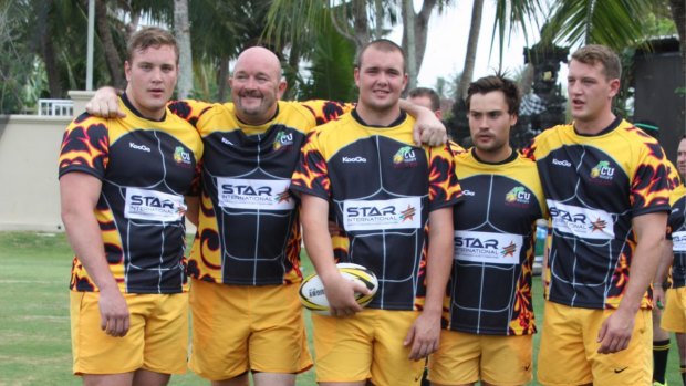 An 18-year-old Ollie Hoskins (left) with his father Nick (second from left) at the Bali 10s, alongside two brothers and a cousin. 