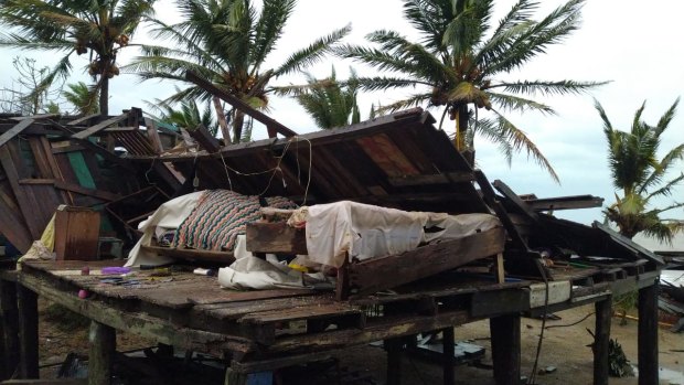 A severely damaged house is seen next to the coast in Puerto Cabezas, Nicaragua. 