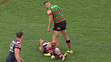 Latrell Mitchell standing over Toby Rodwell.