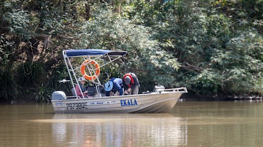 Researchers working on the Logan River.