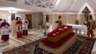 Pope Francis in a casket in the Vatican.