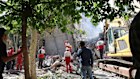 In this photo released by the Iranian Red Crescent Society rescuers work at the scene of an explosion after an Israeli strike in Tehran, Iran, Friday, June 13, 2025. 