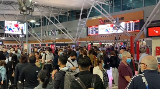 Passengers at Sydney Airport have reported long delays to catch flights on Thursday night.