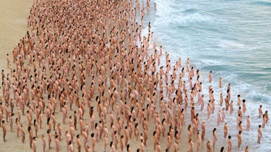 Sydneysiders stripped nude to take part in a Spencer Tunick shoot at Bondi Beach last year.