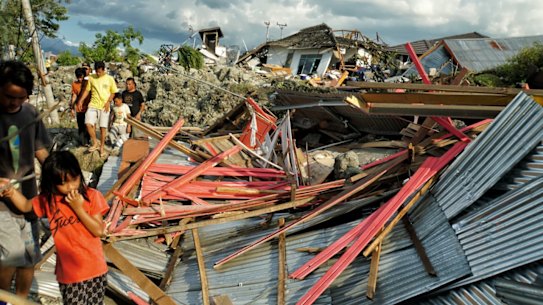 Water 'was twice the size of my house': Fears for thousands as quake toll climbs