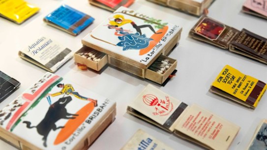 Matchbooks promoting former Brisbane businesses, from the collection of Donat Taharij in the exhibition Precious at the Museum of Brisbane.
